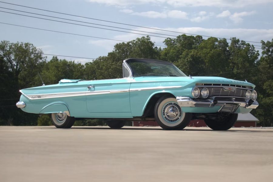 Turquoise 1961 Chevrolet Impala SS Convertible, front three quarter view