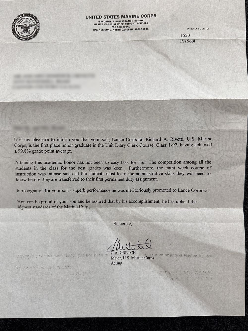Full letter from the United States Marine Corps Personnel Administration School naming Lance Corporal Richard A. Rivetti first place honor graduate of the Unit Diary Clerk Course with a 99.8 percent grade point average, family details blurred